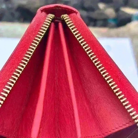 Red YSL long zippy wallet. Calfskin Leather. In GUC. Minor wear. Comes with COA - Picture 7 of 14